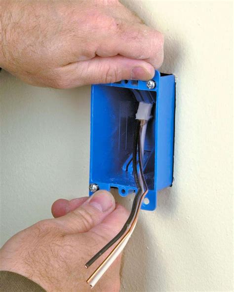 how to get small electric box out of wall|remove wire from electrical outlet.